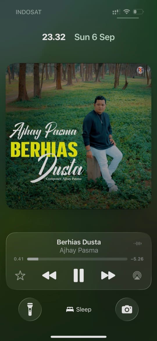 Pemutar musik karya Ajhay Pasma pada perangkat mobile